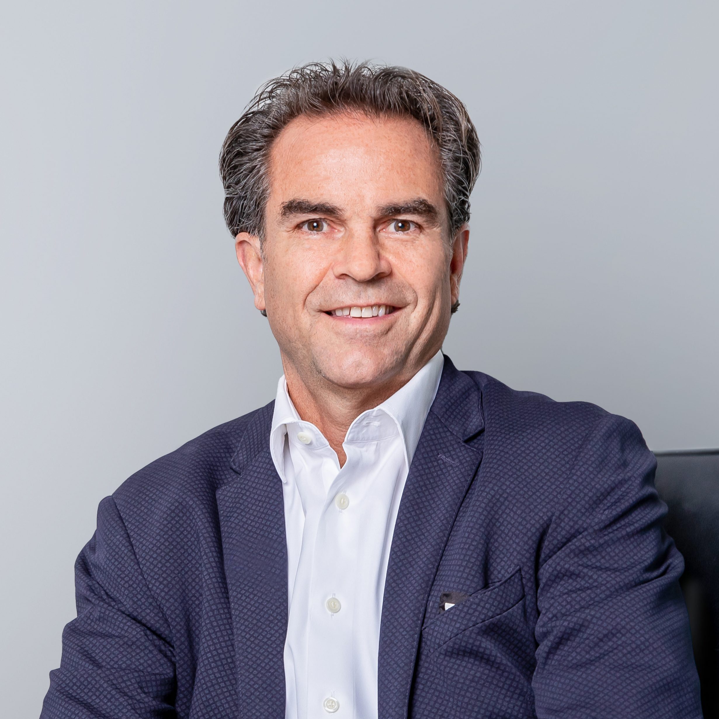 MARTIN CHARLWOOD, President & CEO